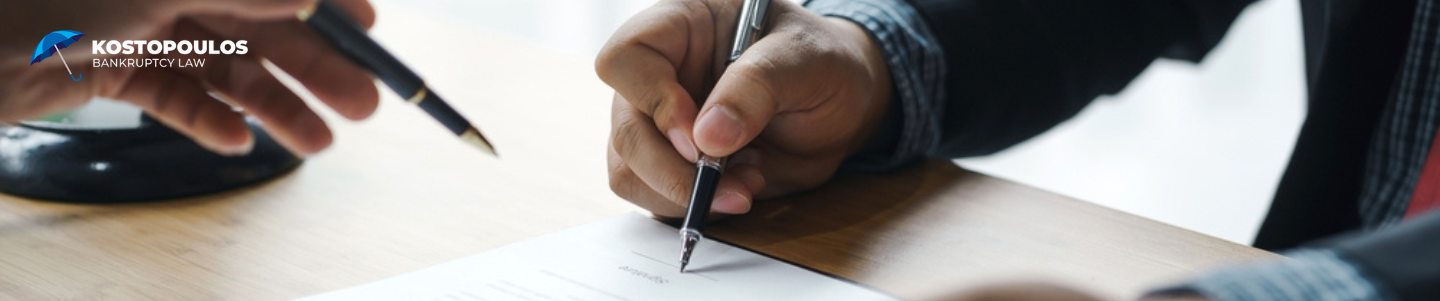 Client signing bankruptcy documents to protect a vehicle in Michigan